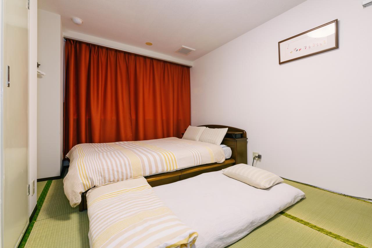 פוקואוקה Guest House Chiharu מראה חיצוני תמונה